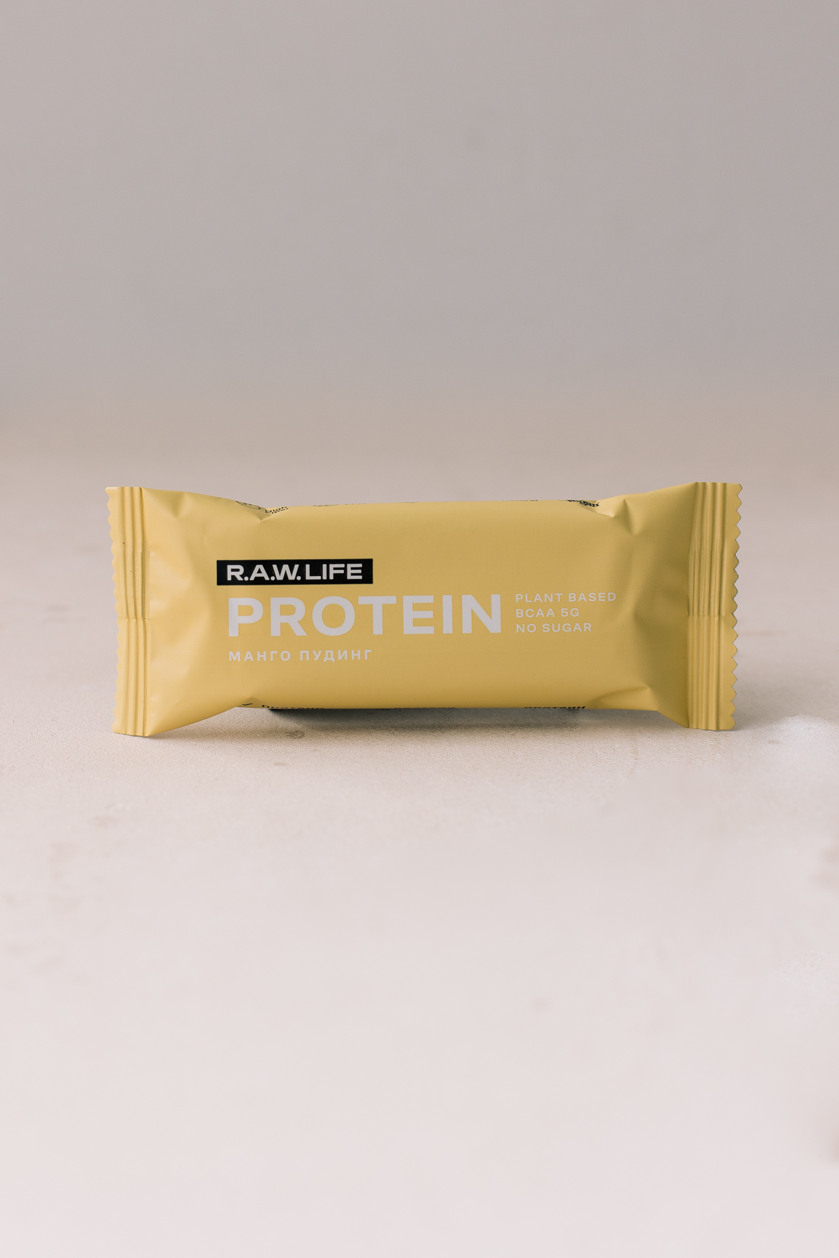 

BU// Протеиновый батончик R.A.W. Life Protein "Манго пудинг" 43g