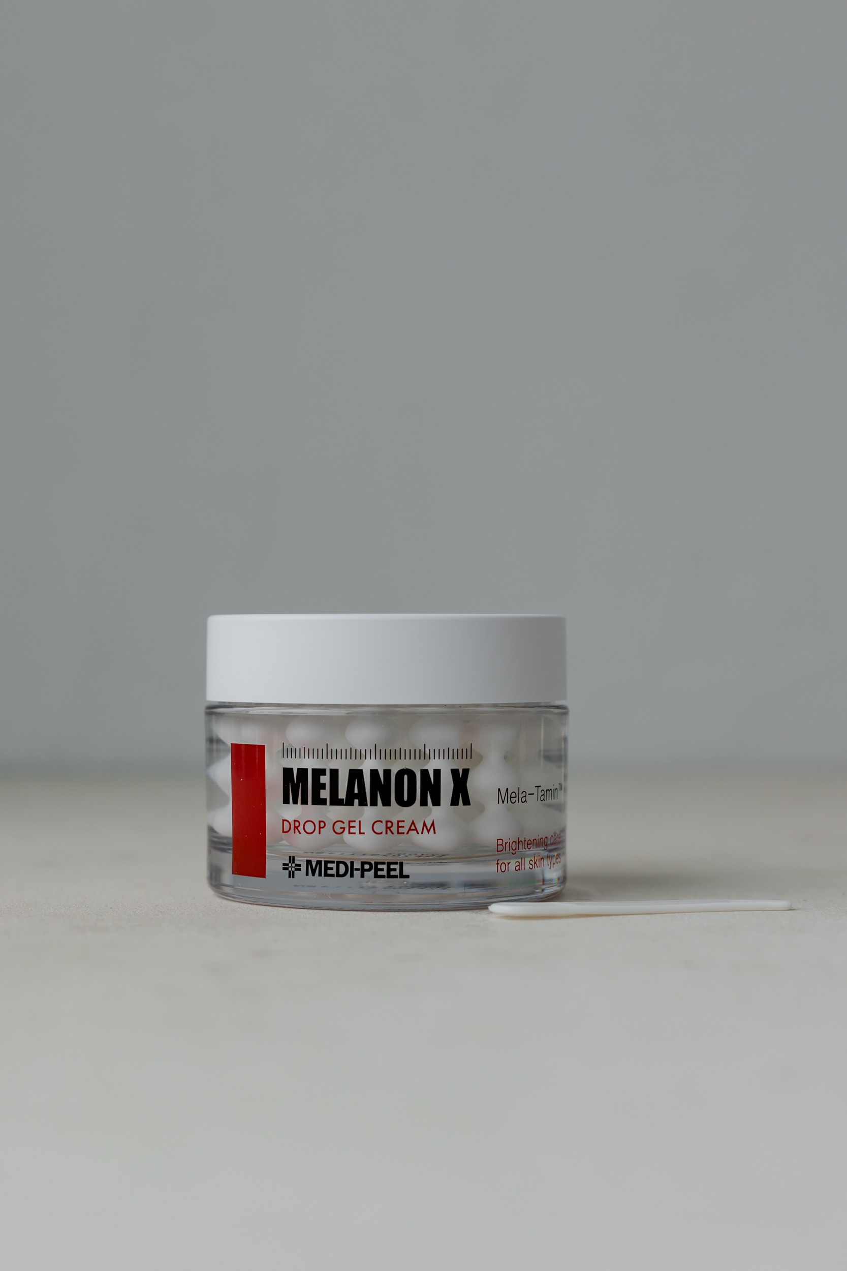 Витаминно-осветляющий капсульный крем MEDI-PEEL Melanon X Drop Gel Cream 50g