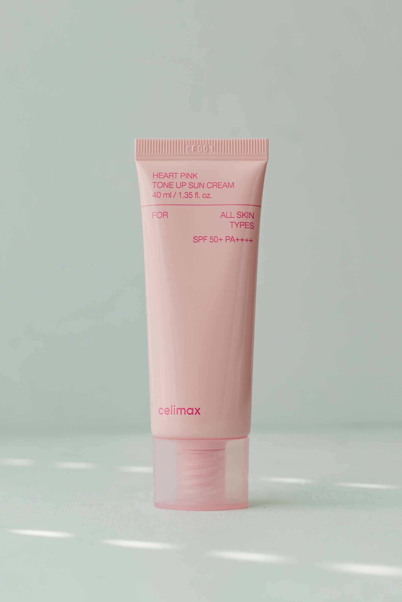 Cолнцезащитный крем, выравнивающий тон кожи Celimax Heart Pink Tone Up Sun Cream SPF50+ PA++++ 40ml - фото 1