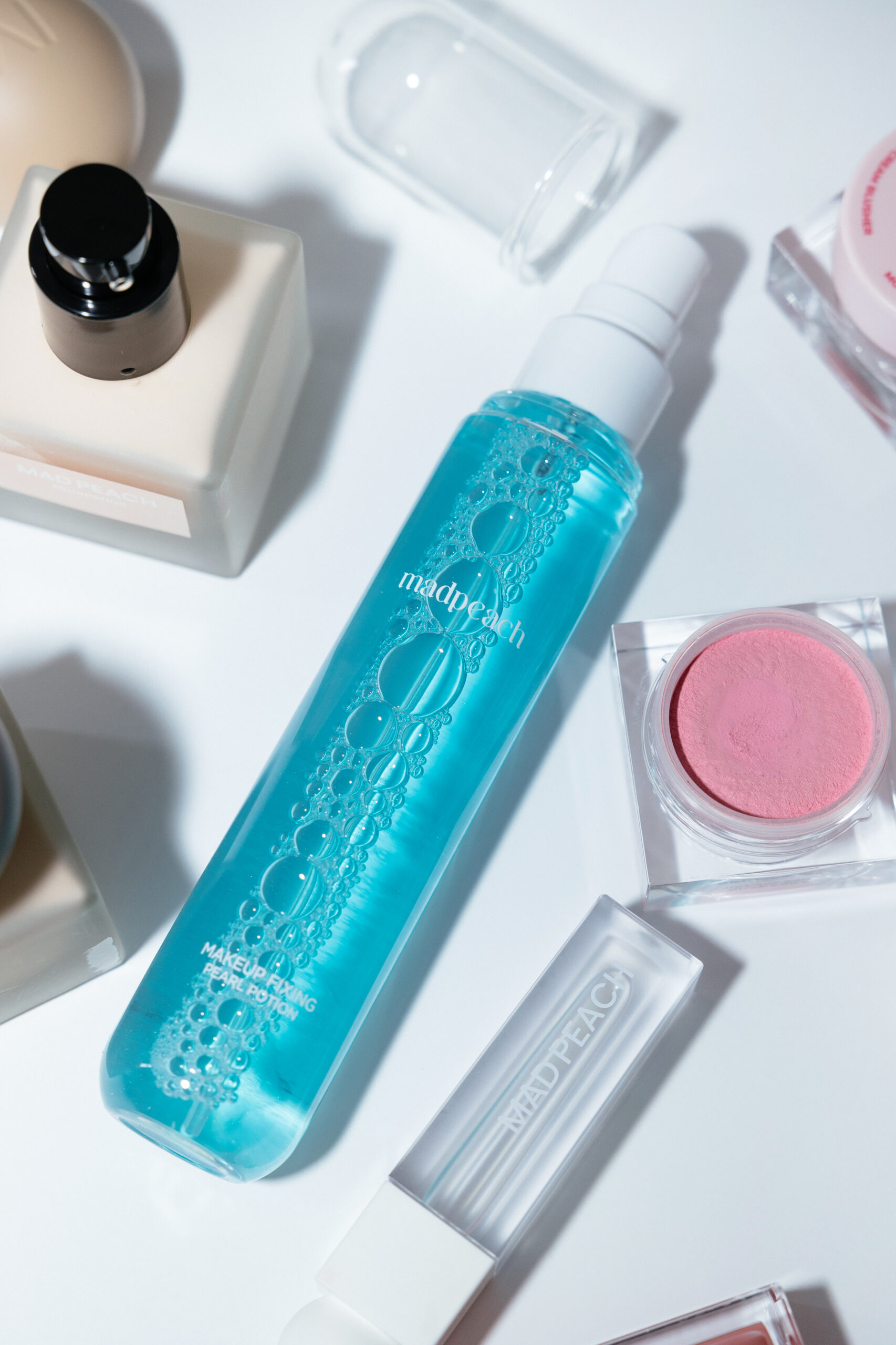 

Фиксирующий спрей MAD PEACH Make Up Fixing Pearl Potion 80ml